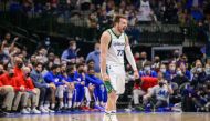 Dallas Mavericks guard Luka Doncic (77) celebrates during the second half against the Philadelphia 76ers at the American Airlines Center. Mandatory Credit: Jerome Miron
