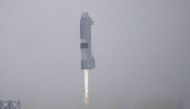 FILE PHOTO: Spacex SN15 starship prototype comes in for a successful landing for the first time from the company's starship facility in Boca Chica, Texas, U.S. May 5, 2021. REUTERS/Gene Blevins/File Photo
