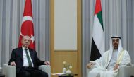 Turkish President Tayyip Erdogan meets with Abu Dhabi's Crown Prince Sheikh Mohammed bin Zayed al-Nahyan in Abu Dhabi, United Arab Emirates February 14, 2022. Presidential Press Office/Handout via Reuters