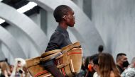 A model presents a creation from the Fendi Fall/Winter 2022/2023 collection during Fashion Week in Milan, Italy, February 23, 2022. REUTERS/Alessandro Garofalo
