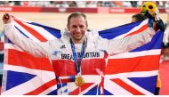 August 8, 2021 Gold medallist Jason Kenny of Britain poses with his medal and a British flag. REUTERS/Matthew Childs/File Photo

