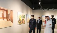 Officials at the launch of an exhibition of artworks created by inmates. 