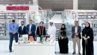 Minister of State and Qatar National Library President H E Dr Hamad bin Abdulaziz Al Kawari and other officials during the event.