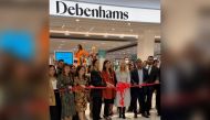 City Center and Debenhams representatives at the opening ceremony of Debenhams store at City Center Doha, on March 11, 2022. 