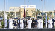 H E Dr. Mohammed bin Saleh Al Sada, Chairman of UDST’s Board of Trustees, and other officials at the flag raising ceremony. 