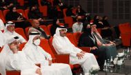 Minister of Culture H E Sheikh Abdul Rahman bin Hamad Al Thani; Assistant Foreign Minister H E Lolwah bint Rashid Al Khater; Qatar University President Dr. Hassan Rashid Al Derham; and others attending the seminar on Arabic language at Qatar University, yesterday. 