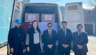 Acting Charge d’Affaires at the Embassy of Qatar in Moldova Hamad bin Rashid Al Athba with other officials during the handing over of the aid.