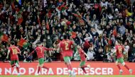 Portugal's Bruno Fernandes celebrates scoring their first goal with teammates Reuters/Miguel Vidal