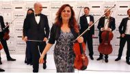 Merve Kenet Bulun with other QPO musicians.