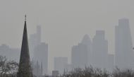 The City of London financial district is seen from Primrose Hill as high air pollution obscures the skyline over London April 10, 2015. Local media reports that southeastern England could reach the highest level of air pollution today. REUTERS/Toby Melville//File Photo