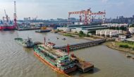 Oil tankers are seen at a terminal of Sinopec Yaogang oil depot in Nantong, Jiangsu province, China June 11, 2019. REUTERS/Stringer

