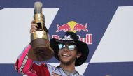 Enea Bastianini of Italy (23) celebrates on the podium after winning the MotoGP race at the Red Bull Grand Prix of the Americas MotoGP at Circuit of the Americas. Mandatory Credit: Chuck Burton-USA TODAY Sports
