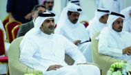 Minister of Culture H E Sheikh Abdulrahman bin Hamad Al Thani (left) during an event on the sidelines of Ramadan Book Fair,  yesterday.