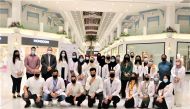 A group photo of Qatar University pharmacy students at Landmark Mall.  