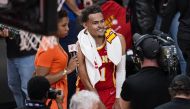 Atlanta Hawks guard Trae Young (11) reacts before being interviewed after the Hawks defeated the Miami Heat in game three of the first round for the 2022 NBA playoffs at State Farm Arena. Mandatory Credit: Dale Zanine