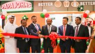 Officials cut the ribbon at Lulu Ain Khaled to open the 39th Papa John's outlet in Qatar.