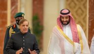 Saudi Crown Prince Mohammed bin Salman meets Pakistan's Prime Minister Shehbaz Sharif upon his arrival in Jeddah, Saudi Arabia, April 29, 2022. 