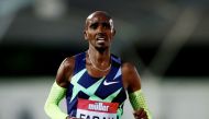 June 25, 2021 Britain's Mo Farah reacts after the Men's 10,000m as he fails to qualify for the 10,000m at the Tokyo Olympics Action Images via Reuters/Molly Darlington

