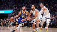 Golden State Warriors guard Stephen Curry (30) dribbles past Memphis Grizzlies forward Kyle Anderson (1) and guard Dillon Brooks (24) in the third quarter during game six of the second round for the 2022 NBA playoffs at Chase Center.  Cary Edmondson
