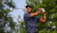 Tiger Woods plays his shot on the 14th tee during the first round of the PGA Championship golf tournament. Mandatory Credit: Orlando Ramirez-USA TODAY Sports
