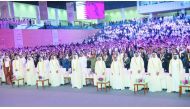 Deputy Amir H H Sheikh Abdullah bin Hamad Al Thani attending the the graduation ceremony of Qatar University's 45th batch at the QU Sport and Events Complex, yesterday.