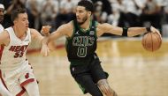 Boston Celtics forward Jayson Tatum (0) drives to the basket against Miami Heat guard Duncan Robinson (55) during the second half of game five of the 2022 eastern conference finals at FTX Arena.Jim Rassol