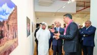 Bassem Mahamid, Director of Museums at the Jordanian Antiquities Department, explaining to Katara General Manager, Dr Khalid Ibrahim Al Sulaiti and other dignitaries about the exhibition.