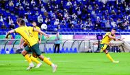 Australia’s Ajdin Hrustic shoots to score during an earlier FIFA World Cup Qatar 2022 Asia Qualifier against Japan in Saitama, Japan in this October 12, 2021 file photo.