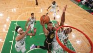 Golden State Warriors guard Stephen Curry (30) attempts a layup against Boston Celtics center Al Horford (42) during the first quarter of game four in the 2022 NBA Finals at the TD Garden. Elsa/Pool Photo-USA TODAY Sports