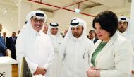 Minister of State and Head of Qatar National Library H E Dr. Hamad bin Abdulaziz Al Kuwari (left), Prof Dr. Khalid bin Ibrahim Al Sulaiti, General Manager of the Cultural Village Foundation, Katara (centre), and Prime Minister of the Republic of Moldova H E Natalia Gavrilita (right) during the opening of the exhibition, Image of the World in Stone and Metal, at Katara.