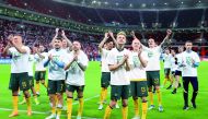 Australia players celebrate after qualifying for FIFA World Cup Qatar 2022 