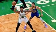 Boston Celtics guard Marcus Smart (36) handles the ball against Golden State Warriors guard Stephen Curry (30) during the first quarter in game six of the 2022 NBA Finals at TD Garden. Bob DeChiara-USA TODAY Sports