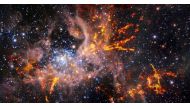 A composite image shows the star-forming region called 30 Doradus, also known as the Tarantula Nebula in this undated handout picture. Handout via Reuters