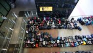 Lines of passenger luggage outside Terminal 2 at Heathrow Airport in London, Britain, recently. (Reuters/Henry Nicholls)