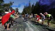 Team Bikeexchange-Jayco's Michael Matthews in action as spectators cheer during stage 14. (REUTERS/Gonzalo Fuentes)