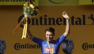 Belgian Jasper Philipsen celebrates on the podium after winning Tour de France stage 15, in France, on July 17, 2022. (REUTERS/Gonzalo Fuentes)