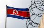 A North Korea flag flutters next to concertina wire at the North Korean embassy in Kuala Lumpur, Malaysia March 9, 2017. REUTERS/Edgar Su/File Photo 