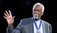 Boston Celtics' legend Bill Russell stands with his Presidential Medal of Freedom during the NBA All-Star basketball game in Los Angeles, February 20, 2011. REUTERS/Danny Moloshok/File Photo