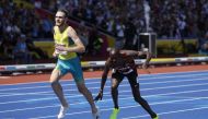 Australia's Oliver Hoare crosses the line to win the final as Kenya's Timothy Cheruiyot places second. (Reuters/John Sibley)