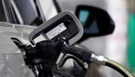 A gas pump is inserted inside an Audi vehicle at a Mobil gas station in Beverly Boulevard in West Hollywood, California, U.S., March 10, 2022. Picture taken March 10, 2022. REUTERS/Bing Guan

