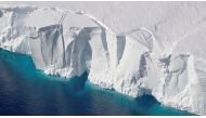 An aerial view of the 200-foot-tall (60-meter-tall) front of the Getz Ice Shelf with cracks, in Antarctica, in this 2016 handout image. NASA/Handout via Reuters