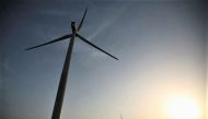 File Photo: Power-generating windmill turbines are pictured during the inauguration ceremony of the new 25 MW ReNew Power wind farm at Kalasar village in the western Indian state of Gujarat on May 6, 2012. (REUTERS/Amit Dave)

