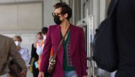 Singer-actor Harry Styles arrived in Venice ahead of the premiere of his new film wearing a look from the Gucci Ha Ha Ha collection. (Twitter / Gucci)