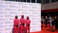  Guests dressed as characters from the series Squid Game arrive at the British Academy Television Awards in London, Britain, May 8, 2022. Reuters/Henry Nicholls/File Photo