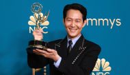 Lee Jung-jae holds his trophy for Outstanding Lead Actor In A Drama Series for 