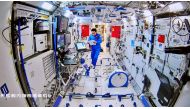 Chinese astronaut Tang Hongbo of the Shenzhou-12 mission works inside the core module Tianhe of the Chinese space station as his colleagues conduct extravehicular activities outside the space station, in this image released by China Manned Space Engineering Office on August 20, 2021.  File Photo/Reuters
