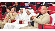 Hassan bin Rashid Al Derham, President of Qatar University, with other officials during the conference.