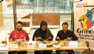 Qatar Foodie, Ashaeveryday and Balu Subramonian on the judging panel at Nando’s Qatar’s Master Grillers’ 2022 finals.