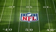 The NFL shield logo is seen at midfield at SoFi Stadium. Super Bowl LVI between the Los Angeles Rams and the Cincinnati Bengals will be played on Feb. 13, 2022. Kirby Lee-USA TODAY Sports


