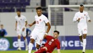 Canada's Charles-Andreas Brym in action with Qatar's Bassam Hisham Ali Al-Rawi during a friendly match at Estadio Franz Horr, Vienna, Austria, on September 23, 2022. (REUTERS/Lisa Leutner)